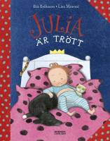 Bok där flickan Julia ligger på sängen i randig pyjamas tillsammans med sin hund och ser trött ut.